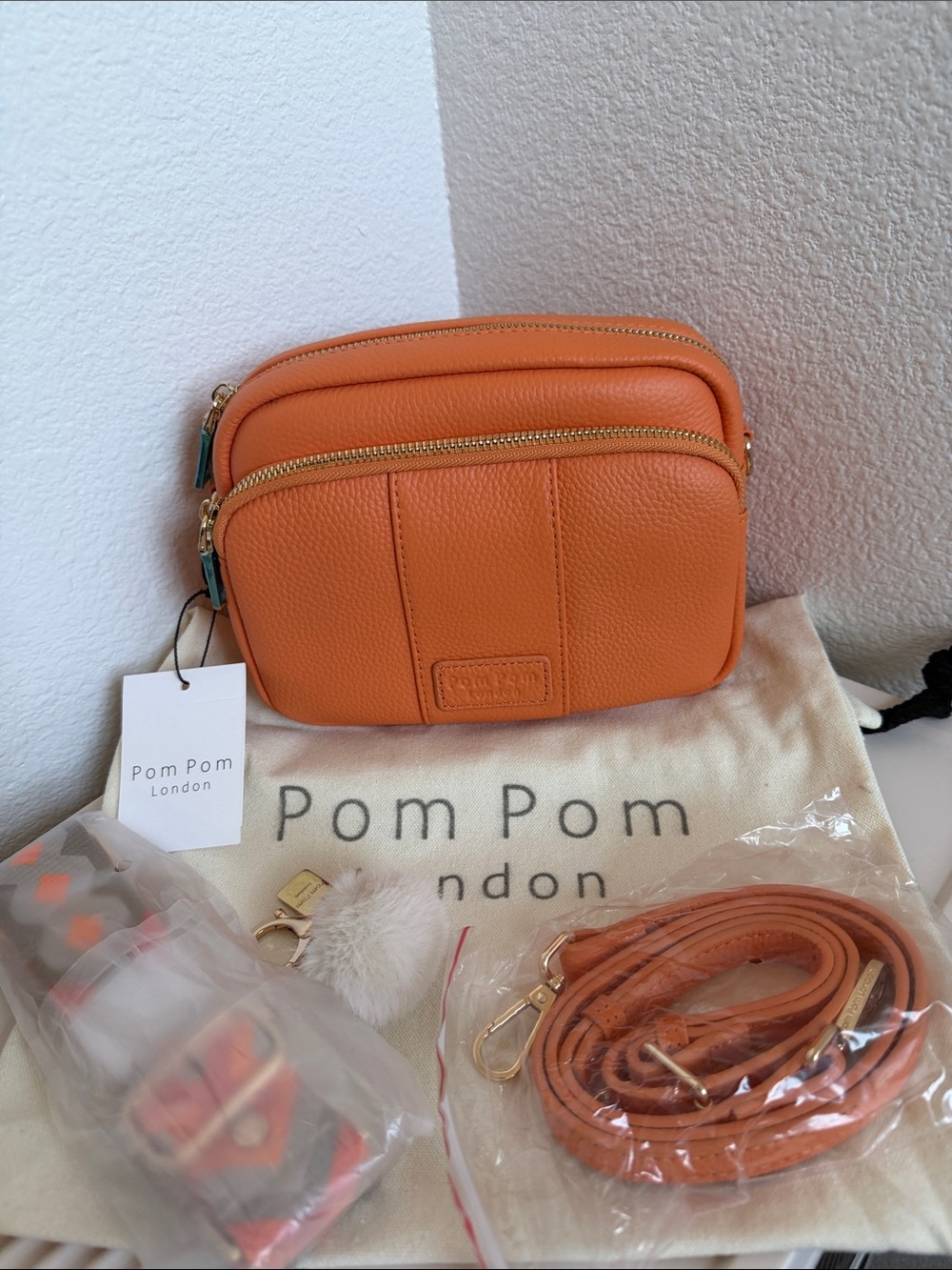 NWT ORIGINAL Pom Pom London
Tangerine / Orange Mayfair Crossbody Bag .